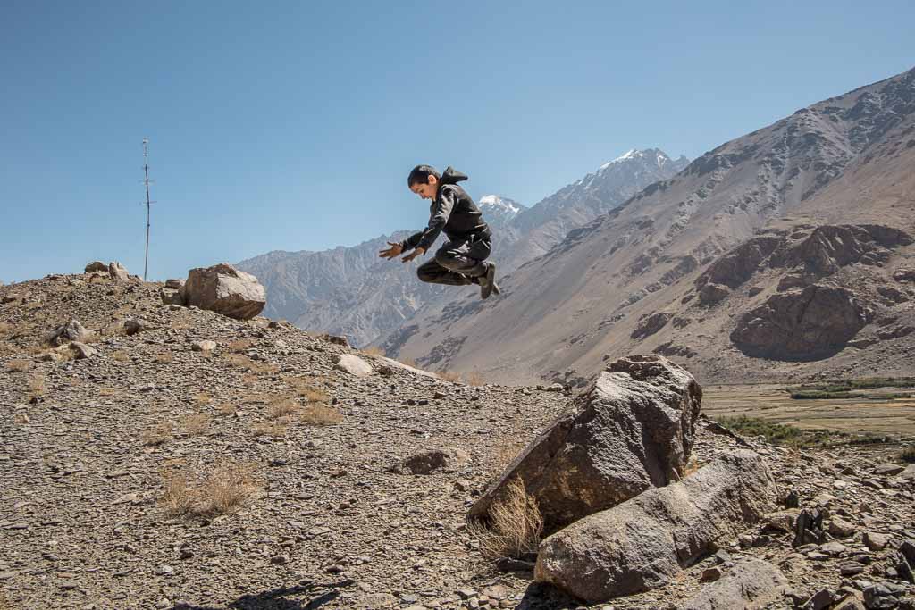 Wakhan, Tajik Wakhan, Wakhan Valley, Wakhan Tajikistan, Wakhan Valley Tajikistan, Tajikistan, Gorno Badakhshan Autonomous Oblast, Badakhshan, GBAO, Pamir, Namadgut, Khaakha, Khaakha fortress, Wakhi boy, Wakhi child, boy jumping