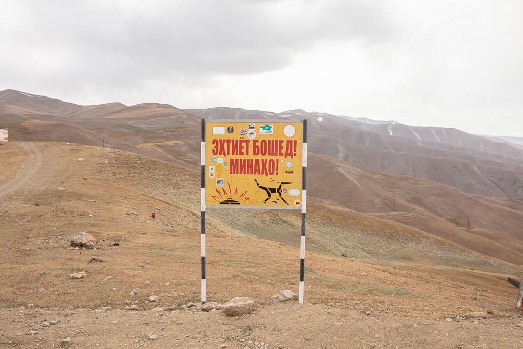 Landmine sign, Sagirdasht Pass, Pamir Highway northern route, Tajikistan