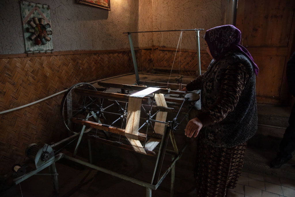 Spinning silk, Yodgorlik Silk Factory, Margilan, Uzbek Fergana Valley, Uzbekistan